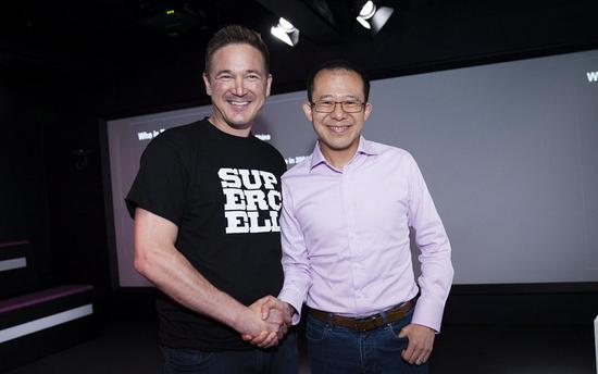 腾讯总裁刘炽平、Supercell CEO Paananen，图/视觉中国