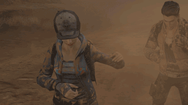  在游戏中，人物角色在沙尘暴中艰难前行