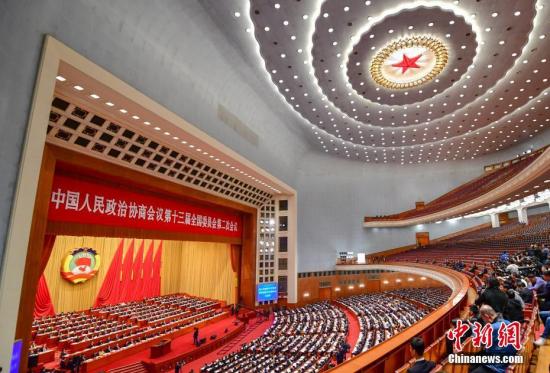 3月10日，全国政协十三届二次会议在北京人民大会堂举行第三次全体会议。中新社记者 于海洋 摄