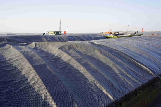 安徽省环保厅对长江非法转移、倾倒固体废物案