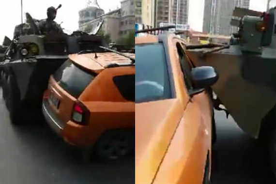 视频：遇上硬茬！女司机抢行撞上装甲车