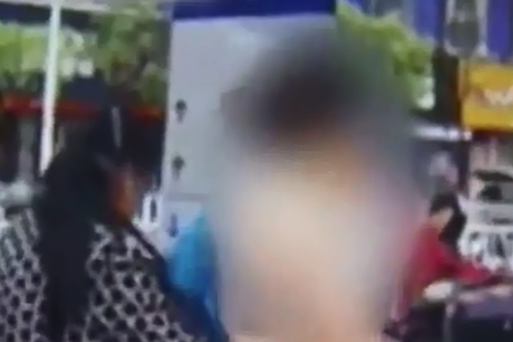 视频：女子闯红灯 脱衣告交警“非礼”