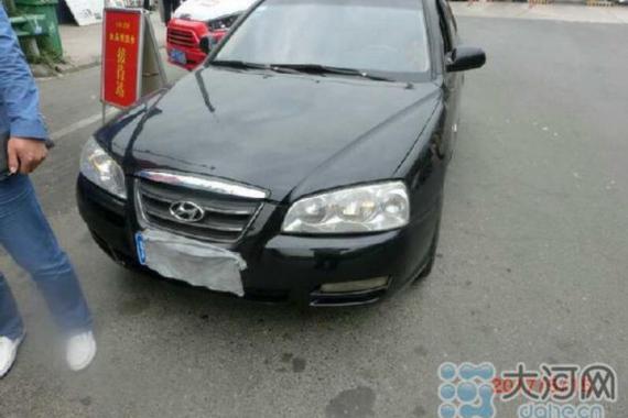 司机高速路上遮挡号牌倒车 扣24分罚400元