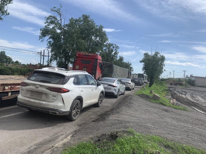 传祺钜浪混动GMC2.0极限首测,一箱油最长跑1711km,百公里油耗3.2L