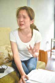 谈起和前夫的纠纷,罗女士伤心不已。
