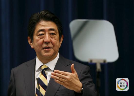 警惕安倍经济学破产的外溢风险