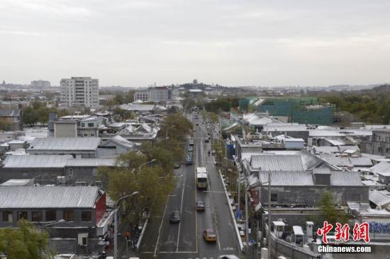 图为北京中轴线的雪后美景 中新网记者 富宇 摄