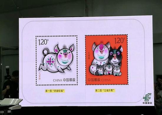 新邮奇谈：猪年生肖邮票预示中国开放三孩？