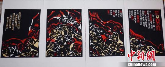 畅杨杨的剪纸作品《南京大屠杀》。　贾亲亲 摄