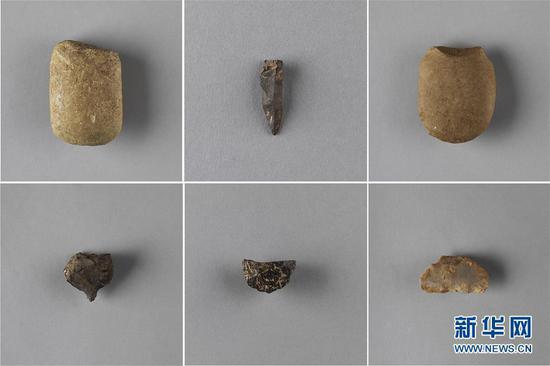 这是贵州贵安新区牛坡洞遗址出土的石器（资料照片）