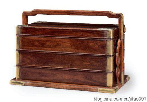 617“清十八世纪黄花梨三层提盒”，24.8×36.8×21cm。，2万-3万美元