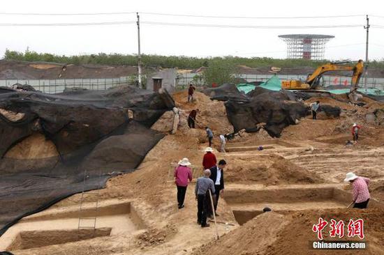 在建工地“惊醒”东周睡梦人现30座古代墓葬(图)