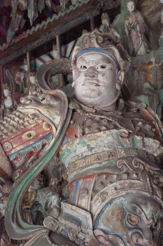 双林寺的韦陀像双目炯炯有神,身姿挺拔又具有动态,栩栩如生。