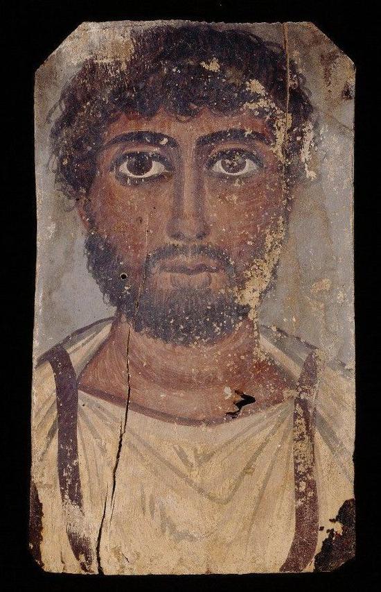 Oak panel bearing tempera portrait of a bearded man wearing a white tunic with purple clavi， 2ndC（early） Roman Period。 Courtesy of the British Museum。