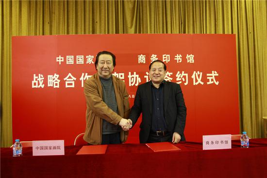 　　中国国家画院和商务印书馆战略合作框架协议签约仪式现场，双方代表：杨晓阳院长和于殿利总经理。 (2)