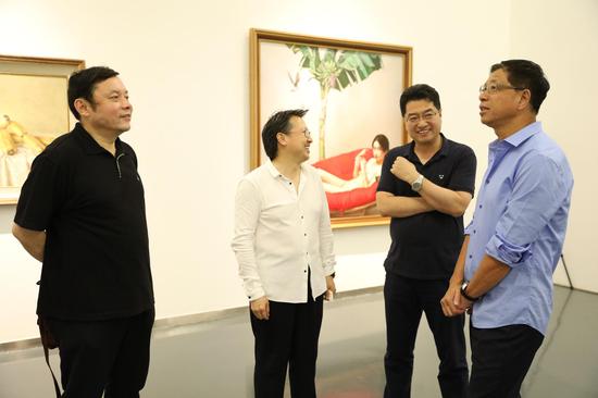 左起:参展艺术家常磊,参展艺术家李贵君,李大钧,IDG资本合伙人周全