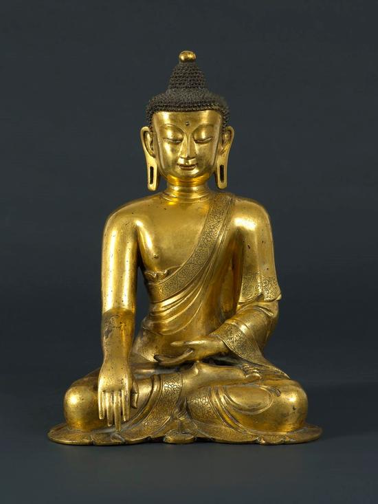 （图7-1）国外私人藏元代铜镀金释迦牟尼佛像 高36厘米