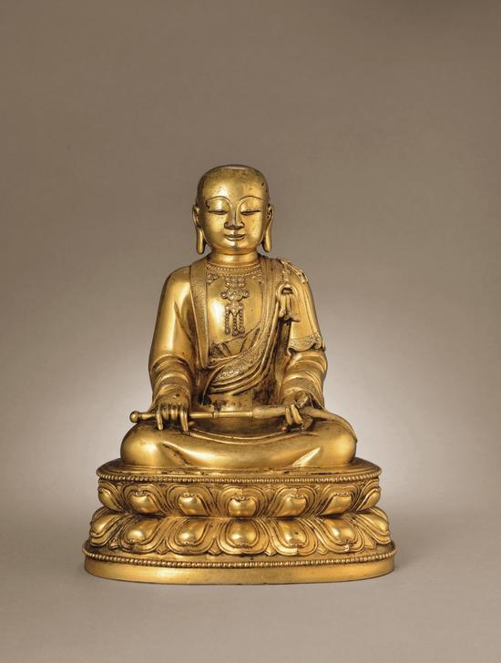 （图21）国内私人藏元代铜镀金迦诺迦跋厘堕阇尊者像 高27.5厘米
