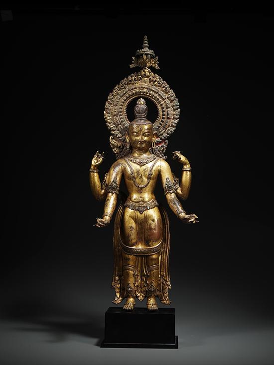 2016西泠秋拍 明·尼泊尔四臂观音 带背光及座高:76.5cm