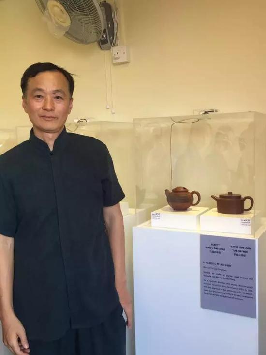 高级工艺美术师——李爱林
参展作品：《百福百寿壶》、《折肩云柱壶》