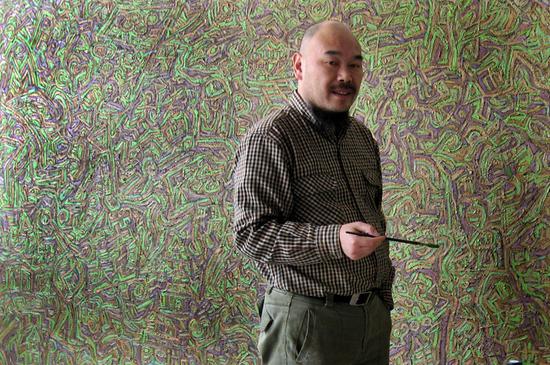 伊灵（原名郭新平） 1961年 生于上海，现定居北京，著名抽象艺术家。。1990年入住圆明园画家村被称为“大胡子村长”。