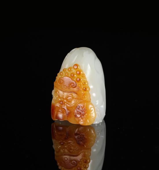 01864 张克山 和田玉籽料国粹印章       规格：3.6×2.6×2.7cm       重量：43.6g