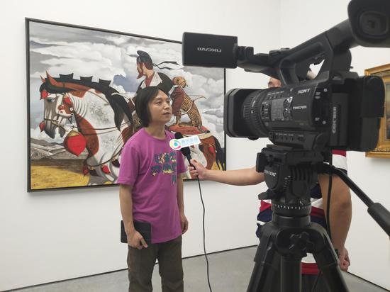 批评家、天津美院郝青松老师接受媒体采访，浅析本次展览主题“后东方学”的内涵