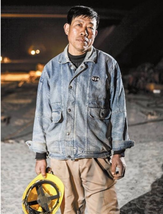 图片说明:何刚