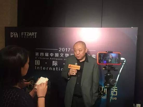 记者采访中拍协艺委会副主任、北京匡时国际拍卖有限公司董事长董国强先生