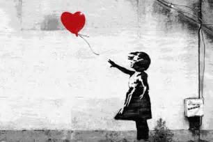 英国街头涂鸦艺术家Banksy的作品“女孩与气球“