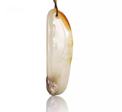 王一卜 和田玉玄机挂件
尺寸:8.1×2.5×1.1cm 42g