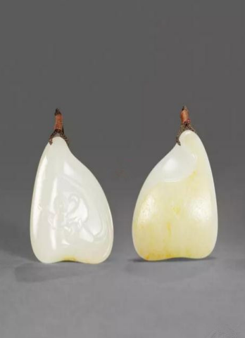 王一卜 和田玉籽料天乐挂件

　　尺寸：4.8×3.9×1.4cm 37g