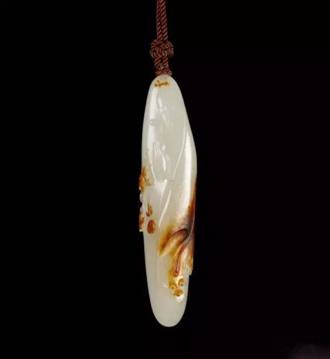 王一卜 和田玉籽料地藏王挂件
规格:7.1×1.5×1.0cm 20g