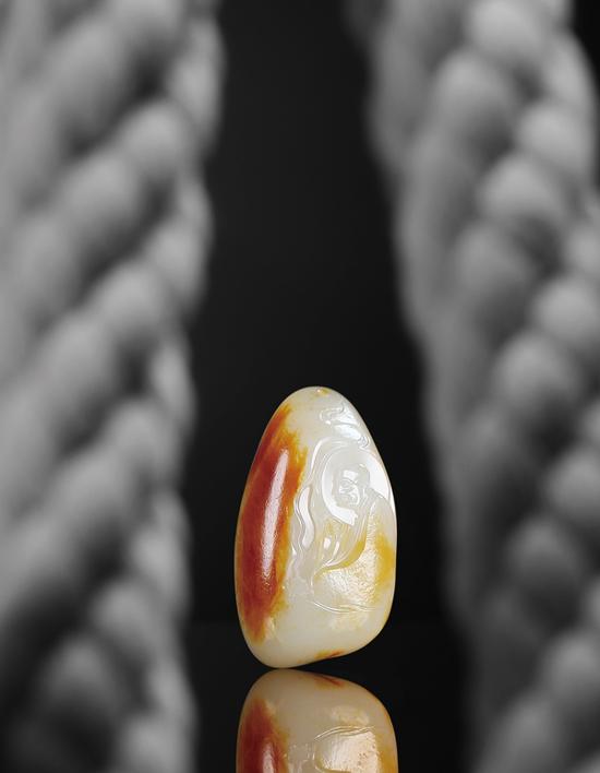 林国华 和田玉籽料诵经罗汉挂件
4.6×2.2×1.9cm 40g