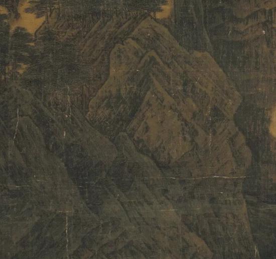 《万壑松风》表现山石的斧劈皴，与本作有相似之处
