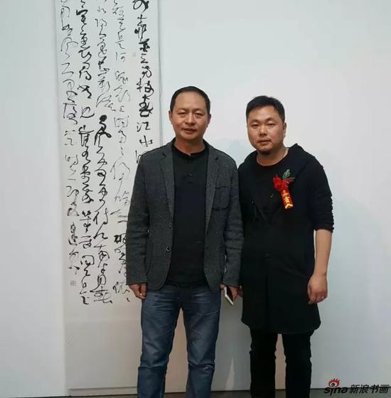 著名书法家李明到秦健书法展现场