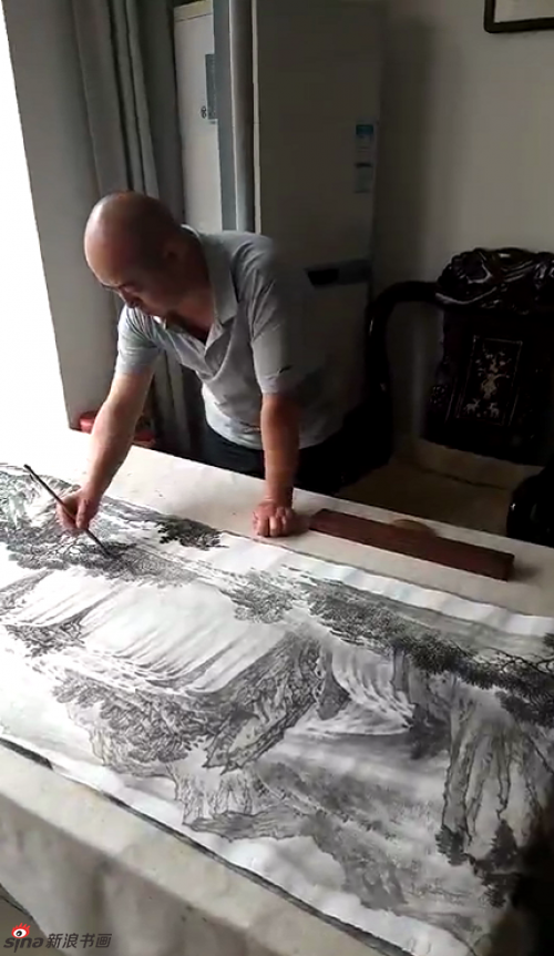 挥毫笔墨山水间 记电视台专访画家林德坤