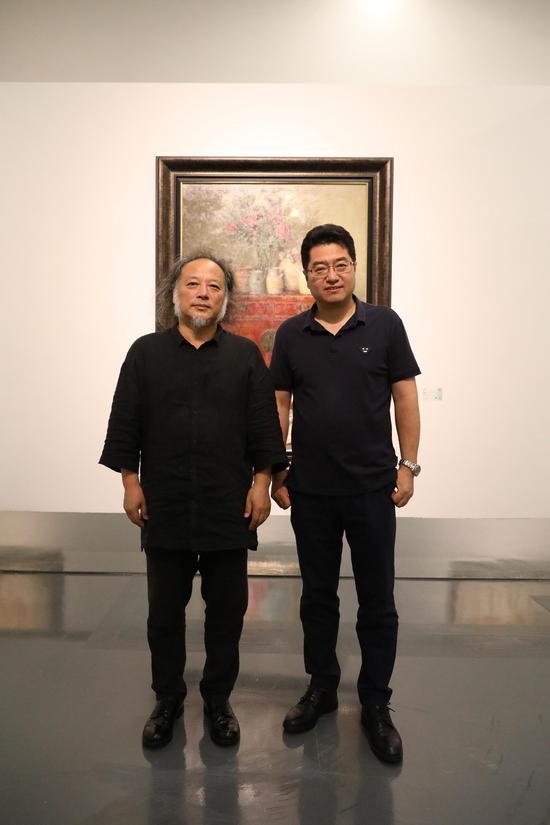左：古琴艺术家王鹏，右：李大钧