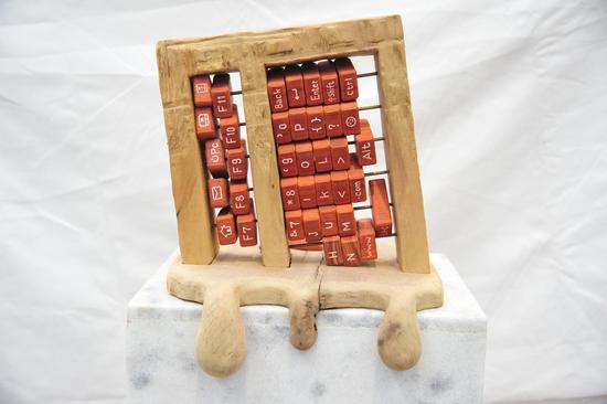 《流逝的年代系列》 陈浪华 材质:木、铜+58x38x32cm