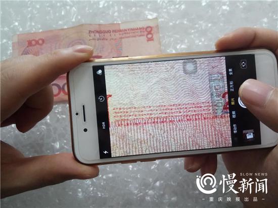 △真币中出现的“RMB100”和“人民币”字样较清晰