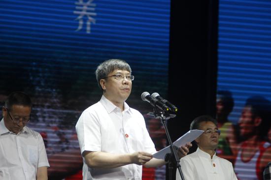 重庆市政协副主席、民革重庆市委主委王新强在会上致辞