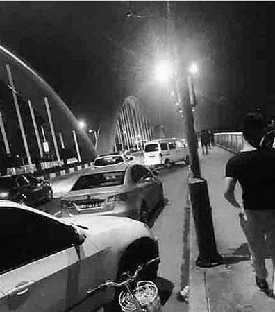 小伙为躲查酒驾 从十几米桥上跳江逃跑