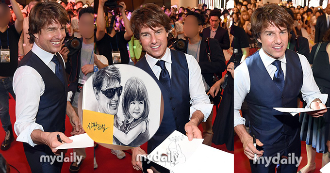 组图：阿汤哥韩国宣传 粉丝举苏瑞画像“诱惑”