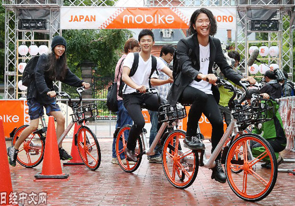 试骑摩拜的日本年轻人（8月22日，日本札幌）