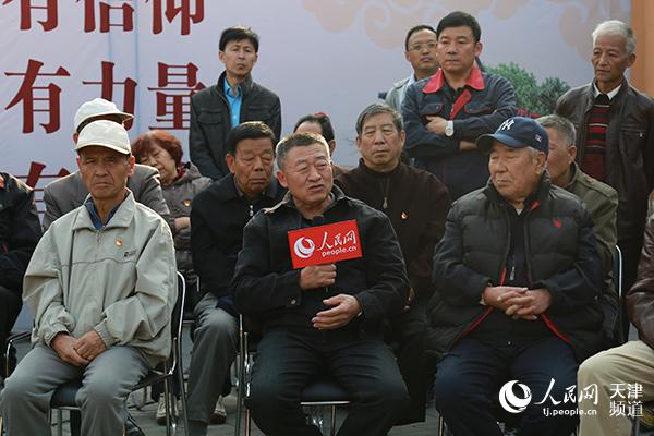 昔阳里社区居民邢月海提问。唐心怡/摄
