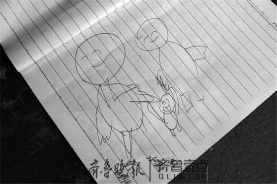 在遗书的后一页,张富画了一个三口之家的简笔画。