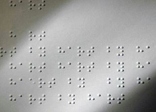 我国已连续5年使用盲文卷