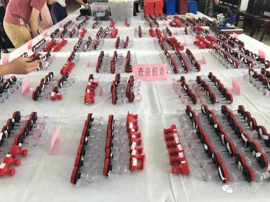 (图为查获的涉案物品)