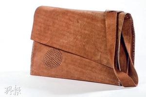 英学生发明聪明手袋 阻止结账专治购物狂(图)