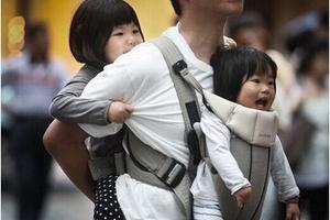 双语:独生子女政策终结 晚婚假也或将取消|独生